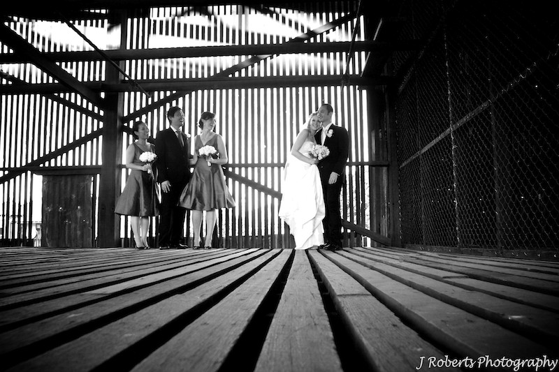 B&W bridal party in dry timber store Cockatoo Island - wedding photography sydney